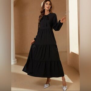 Women’s‎ black tiered dress with tie at neck